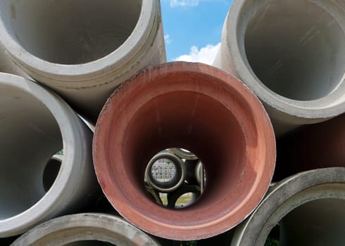 piled up concrete drain pipes
