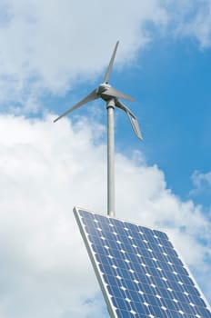 double power supply for an outside measuring instrument by a small solar panel and wind generator