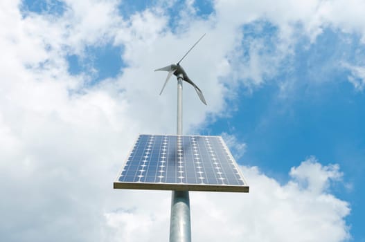 double power supply for an outside measuring instrument by a small solar panel and wind generator