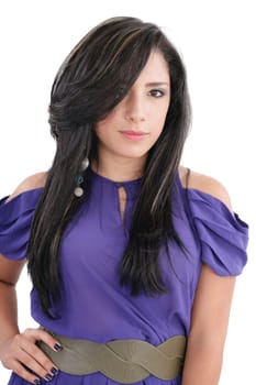 Fashion luxury portrait of young girl teenager in purple style dress with long healthy glossy brown hairs on white background in studio isolated closeup