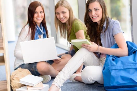 Group of high school students sitting floor self educating