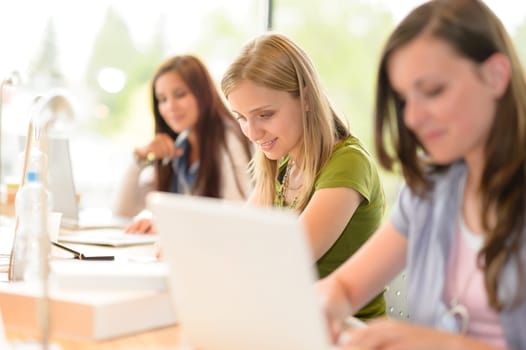 Student teenager in classroom concentrating on study high school