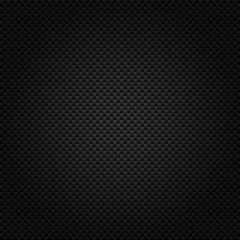 Texture of carbon fiber material. Dark background