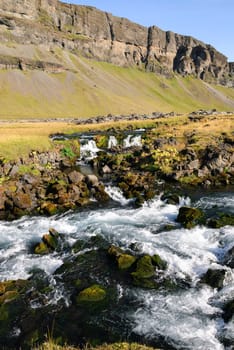 waterfalls and rapids in a river in Vik in Iceland