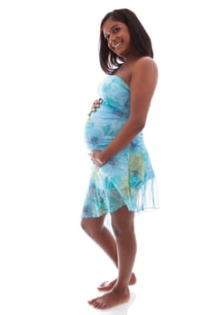Young beautiful pregnant indian woman touching her belly