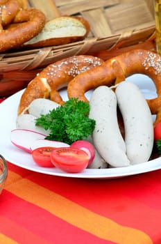 Bavarian snack with white sausages,beer and pretzels