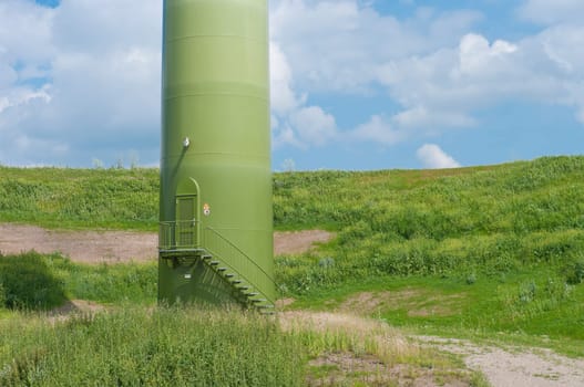 lower part of a wind turbine in different kinds of green