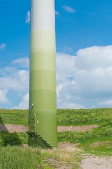lower part of a wind turbine in different kinds of green