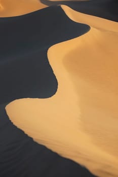 Sahara desert sand dunes at Erg Lihoudi, Morocco.