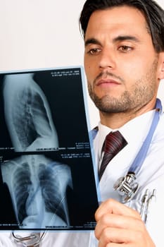 Doctor examining chest x-rays. With copy space.