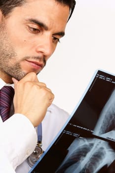 Doctor examining chest x-rays. With copy space.