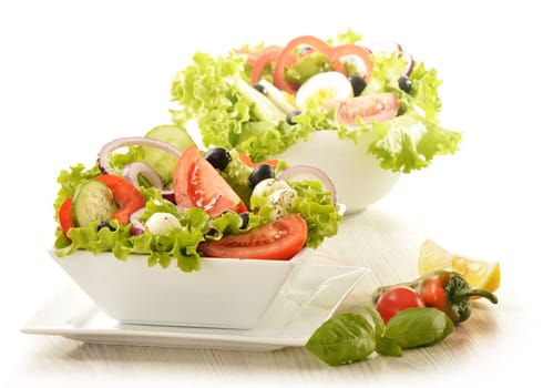Vegetable salad bowl isolated on white