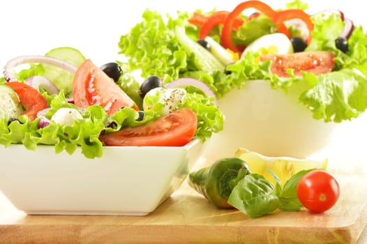 Vegetable salad bowl isolated on white