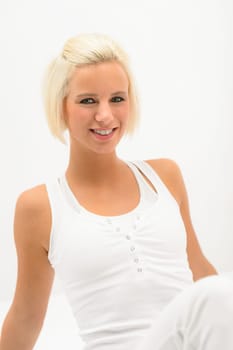 Attractive sportive woman portrait on white background