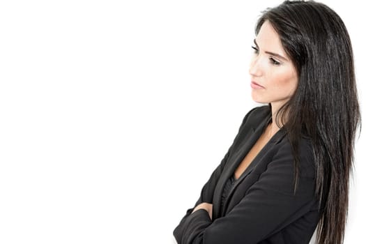Professional working woman in corporate business clothes with a serious look