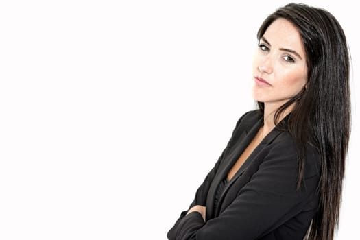 Professional working woman in corporate business clothes with a serious look
