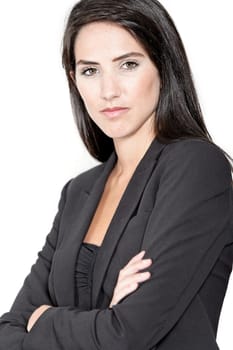 Professional working woman in corporate business clothes with a serious look
