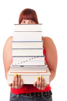 College student carrying a heavy stack of textbooks