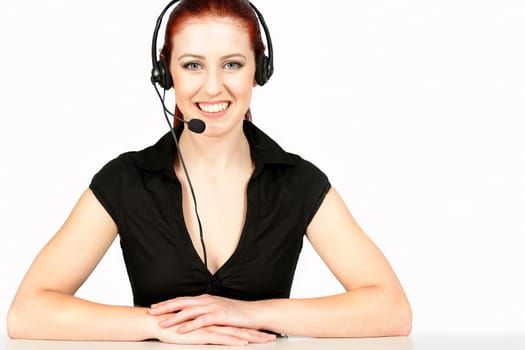 Professional woman talking on a headset in her office at work. With white background