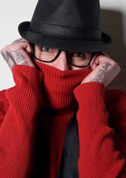 Man with hat and glasses