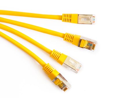 four yellow network cables in a bunch