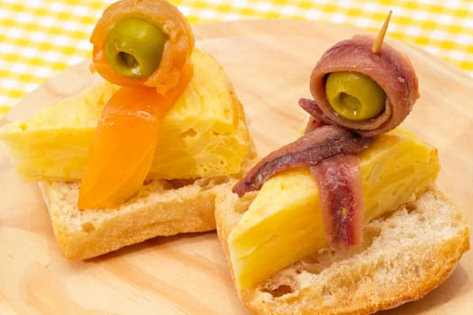 Delicious Appetizer Plate with Salmon, anchovies and Olives