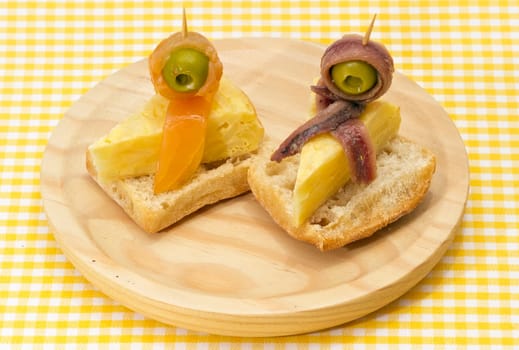 Delicious Appetizer Plate with Salmon, anchovies and Olives
