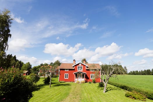 old red cottages, 16th century, typical scenery from sweden