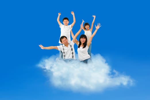 Happy Asian family traveling on cloud over blue sky