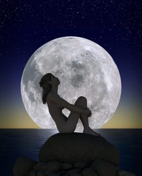 Young woman sitting on a rock against an enormous full moon rising above the horizon on an expansive ocean