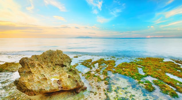 Beautiful seascape. Stone on the foreground. Philippines