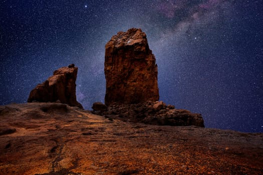 Gran canaria roque nublo in night stars light photo mount