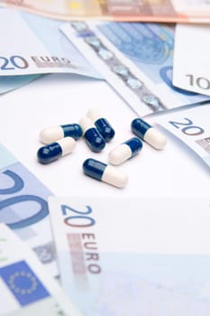 Buy health concept - drugs and money. Medicine and healthcare is a business.