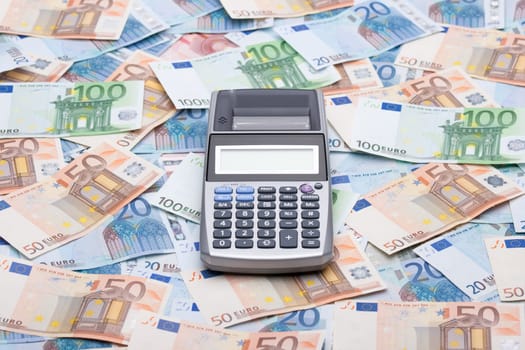 Money and calculator. Calculate your tax, expenses, savings, cash flow, income, costs, budget, insurance.