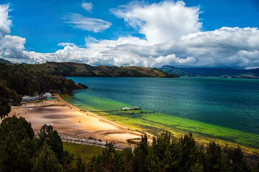 The beautiful deep green and blue colors of Lake Tota.