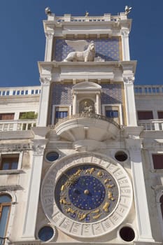 Clock tower in St Mark`s square with zodiac (Venice ,Italy). Vertically.