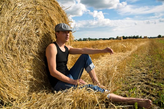 One man seating near rye ball and rest