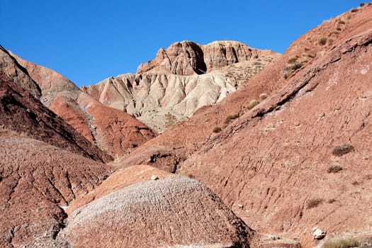 Mountains against blue sky in the Ounila Valley.