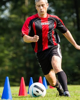 Soccer player dribbling