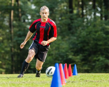 Soccer player dribbling