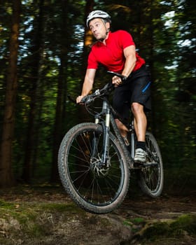 Mountain bikers in the jump