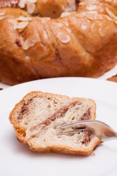 Nut cake with marzipan filling on a plate
