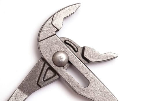 Close-up of a pipe wrench on white background