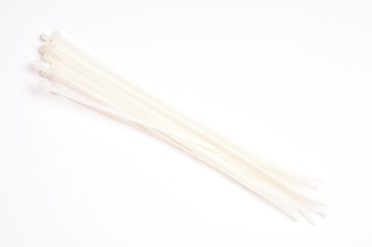 White Cable Ties on Light Background