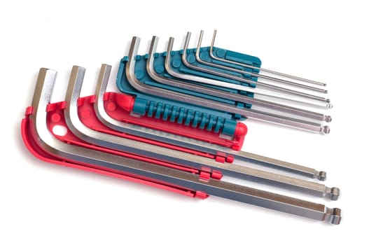 Set of different Allen keys on white background