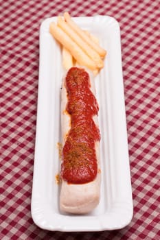 Oberland sausage as currywurst in portrait format