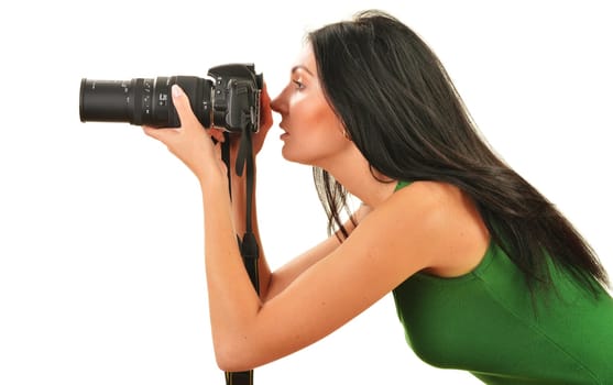 Young woman holding camera isolated on white