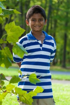 Outdoor portrait of a cute little indian boy