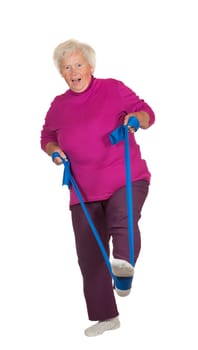 Retried overweight senior woman exercising using a strap for leverage to improve her balance and muscle coordination isolated on white