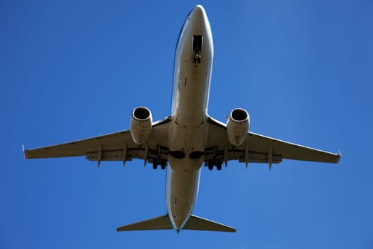 Airplane in the blue sky